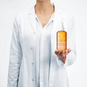 Солнцезащитный водный двухфазный спрей Vichy Капиталь Солей SPF 50+ для лица и тела с бета-каротином 200 мл