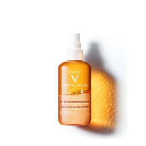 Солнцезащитный водный двухфазный спрей Vichy Капиталь Солей SPF 50+ для лица и тела с бета-каротином 200 мл